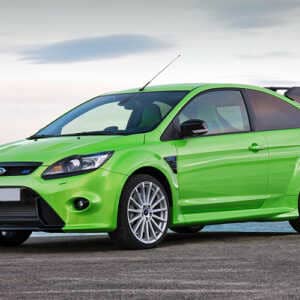 Green Ford Focus RS by the beach. Fitted with Syvecs Ford Focus RS ST MK2 - S7PLUS ECU kit