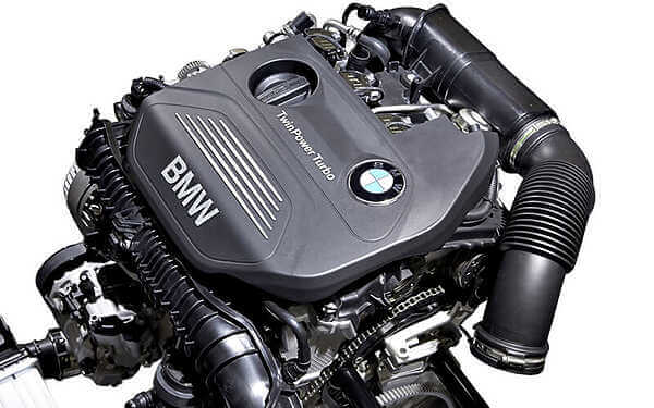 BMW B48 Mini engine out of car on a white background