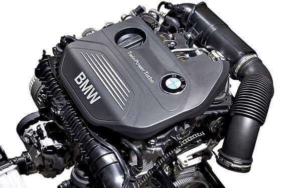 BMW B48TU tuning Mini F56 GP3 F54 Clubman JCW owners. Photo of the B48TU engine out of the car photographed against a white background